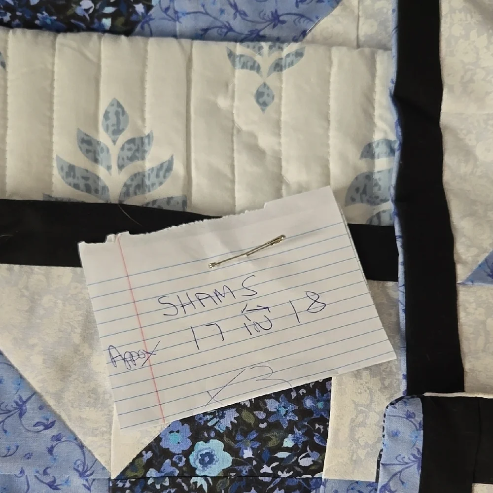 Blue and White Star Pattern Quilt